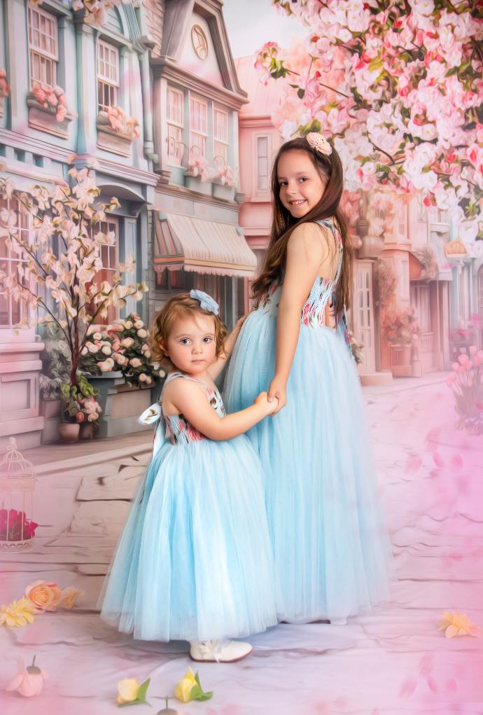 Children's studio portrait with floral backdrop